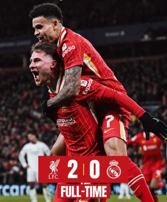 Liverpool vs Real Madrid, Liga Champions 2024, Anfield, kemenangan Liverpool, Mac Allister gol, Gakpo sundulan, penalti gagal, Real Madrid, Kelleher penyelamatan, Liga Champions, puncak klasemen, pertandingan seru, hasil pertandingan, pertandingan Anfield, laga sengit, skor 2-0, kemenangan besar