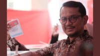 helmi-budiman-pilkada-garut-2 Pilkada Garut, Abdusy Syakur Amin, Luthfianisa Putri, Helmi Budiman, hasil hitung cepat, survei Indikator Indonesia, kemenangan pasangan, partisipasi pemilih, TPS 10, deklarasi kemenangan, kerja keras, masyarakat Garut, pemilu 2024, suara terbanyak, pemilihan bupati, hasil resmi KPU.