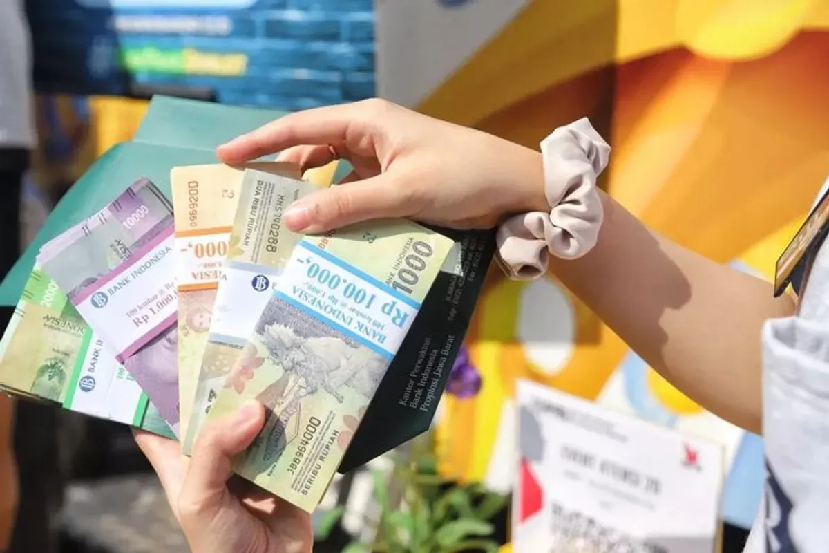 ukar uang, penukaran uang baru, Bank Indonesia, PINTAR BI, Lebaran 2025, uang baru, layanan BI, kas keliling, penukaran online