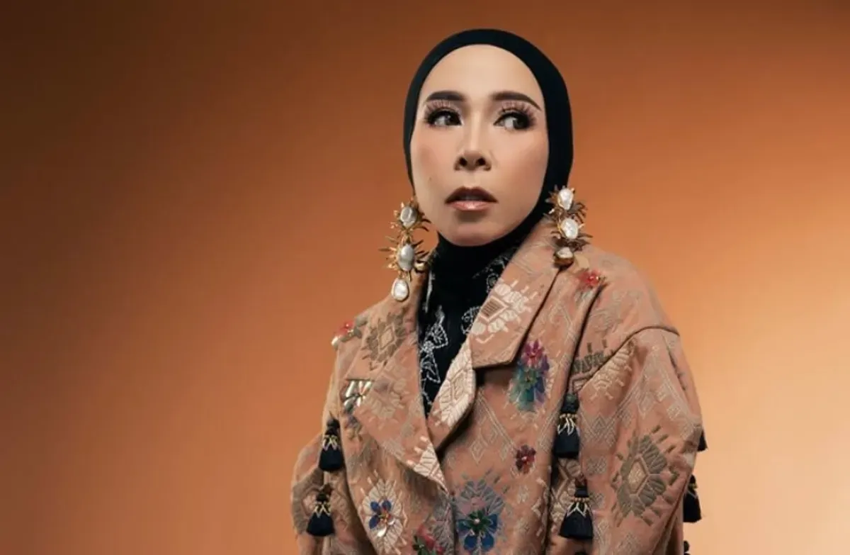 Melly Goeslaw, perubahan wajah, ekspresi datar, operasi bariatrik, potong lambung, turunkan berat badan, Raffi Ahmad, ulang tahun Lily, wajah tirus, kolom komentar.