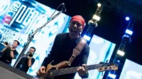 Yuke Sampurna, Dewa 19, kecelakaan anak kecil, berita Tasikmalaya, bassist Indonesia, bantuan korban kecelakaan, profil Yuke Dewa 19, DOM Project, BandSAT, bassist legendaris.