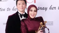 Syahrini Cannes, penghargaan palsu, UNESCO bantah, Listen to Her Parole, karpet merah Syahrini, tas lokal Syahrini, drama penghargaan, klarifikasi UNESCO, Syahrini Vone World, artis kontroversial