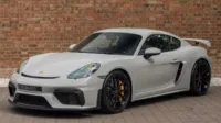 kecelakaan porsche cayman, mobil sport mahal, tabrakan tol sidoarjo, porsche vs rush, harga porsche gt4 rs, spesifikasi cayman gt4, mobil sport indonesia, cayman tabrak rush