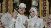 Arbani Yasiz, Raissa Ramadhani, nikah 2025, busana putih, Masjid Istiqlal, resepsi mewah, lamaran Mei, Hari Patah Hati, fans drama, parasocial relationship, seleb Indonesia, pernikahan selebriti, media sosial viral