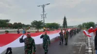kirab bendera, Bogor hujan, merah putih raksasa, HUT RI 80, Stadion Pakansari, Lapangan Tegar Beriman, pasukan berkuda, drumband kemerdekaan