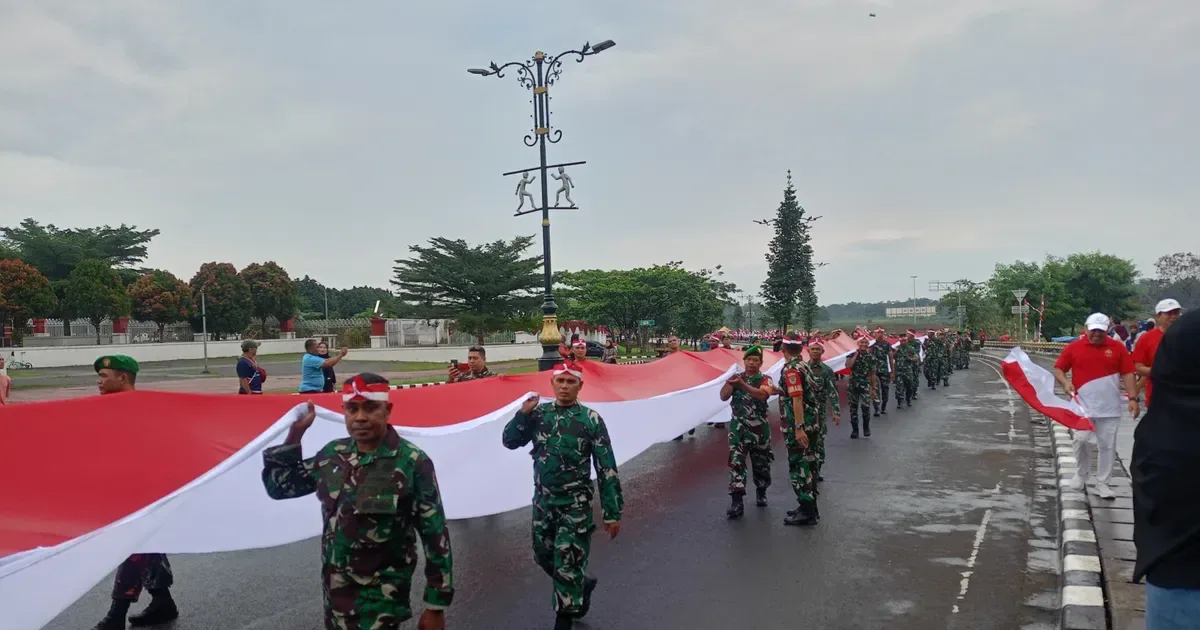 kirab bendera, Bogor hujan, merah putih raksasa, HUT RI 80, Stadion Pakansari, Lapangan Tegar Beriman, pasukan berkuda, drumband kemerdekaan