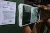 Warga memotret menggunakan telepon seluler surat pemberitahuan dari Pemprov DKI Jakarta yang tertempel di salah satu rumah di kawasan Kalijodo, Jakarta, Minggu (14/2) 17 Agustus 2026, Contoh, Desain, ide, jadwal, Kata-Kata, Libur, Pengumuman, Sekolah, Template, Toko